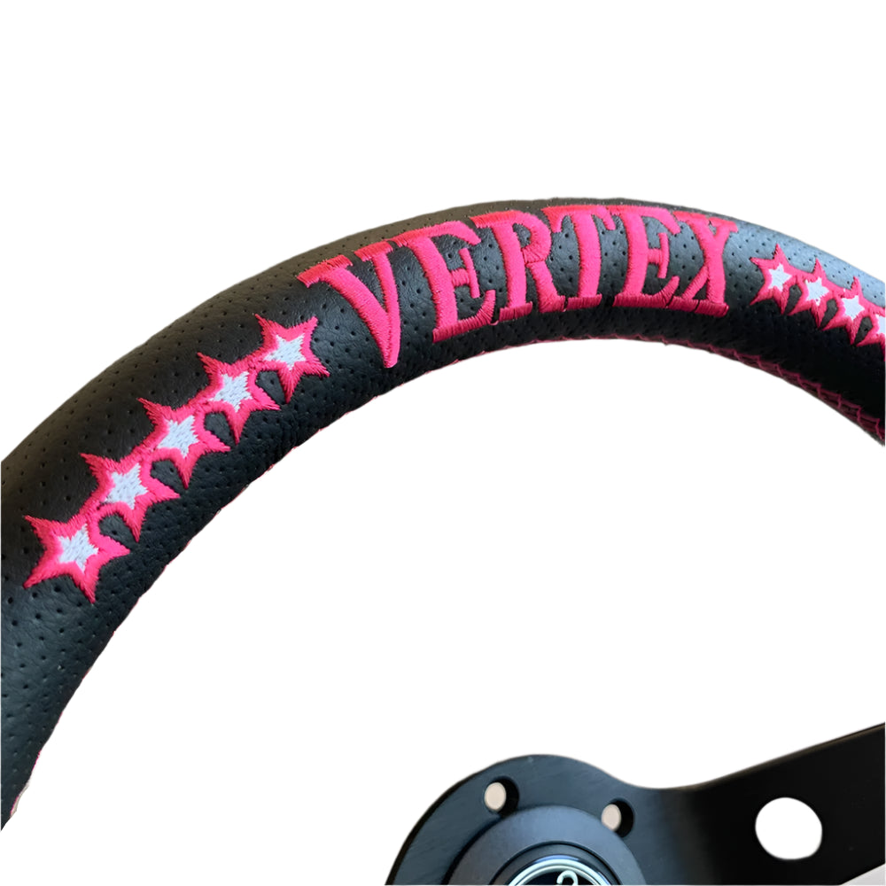 Steering wheel cover with 'VERTEX' branding and pink star patterns